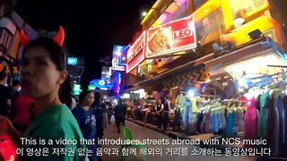 Walking Through Khaosan Road at Night Bangkok Thailand.