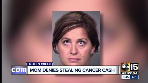 Mother denies stealing from family with cancer