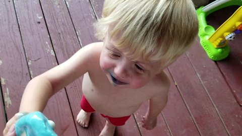 Toddler Furious That His Ice Cream Is Melting