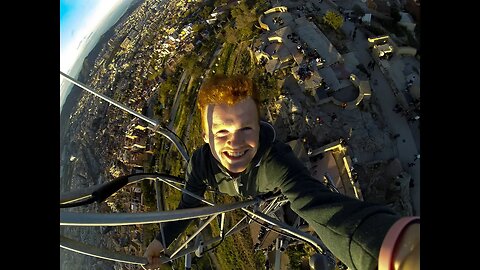 CLIMBING A RADIO TOWER ON TOP OF A MOUNTAIN