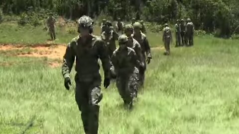 US Marines complete an intense fast ropes training course in Okinawa, Japan