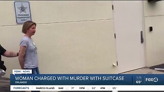 Woman charged with murdering boyfriend with suitcase
