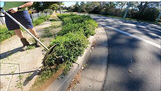 "WHACKY" Aussie Lawnmower Man Helping the Community