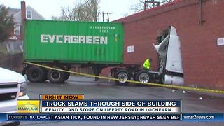 Truck drives through brick wall and into beauty store