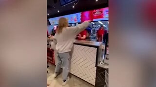 Video: Mcdonald's customer goes on a rampage and spits at staff
