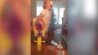 Young Girl Plays Pie Face Game With Her Dad