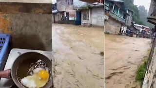 Casually cooking breakfast during insane flooding right outside