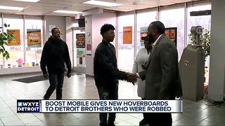 Boost mobile gives new hoverboards to Detroit brothers who were robbed