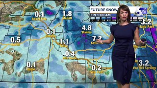 Snow tapers off mid-day Wednesday, with wet but warmer weather returning Thursday