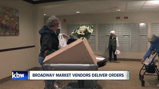 Broadway Market vendors delivering orders to Lancaster Senior Apartments