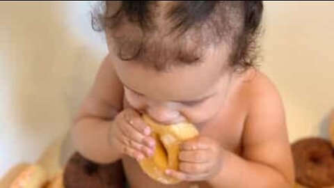 Baby loves to eat donuts in the tub!