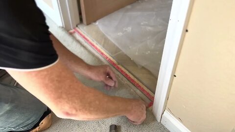 Unedited carpet repair: carpet to tile transition