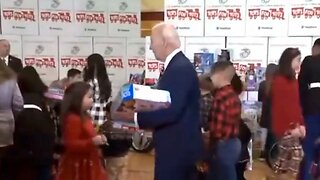 Joe Biden Is Ignored At Christmas Event By Children And Parents While He Has Gifts