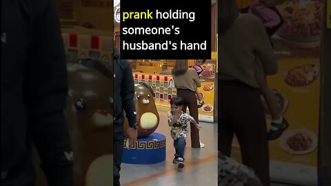 Prank, holding someone’s husband’s hand