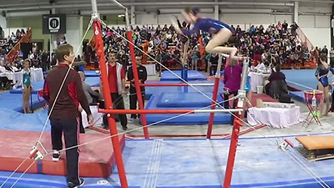 Gymnast Is Saved By Her Coach During Routine