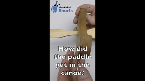 Paddle through the canoe trick