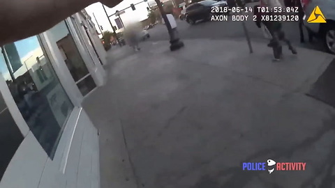 Watch: Cop Gets Hit in Gunfight, Still Able To Reload and Call His Own Ambulance