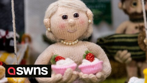 An entirely knitted village with naked characters is on display in Birmingham