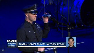 Officer Matthew Rittner's partner remembers his smile, and his laugh