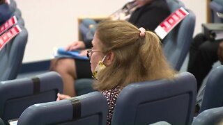 Woman removed from Palm Beach County meeting for not wearing mask
