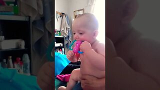 Cute Baby Boy Playing Bumblebee Musical Instrument