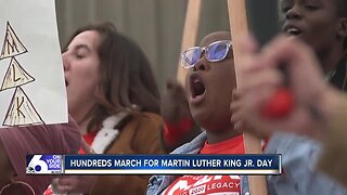Hundreds march to Statehouse for Martin Luther King Jr. Day