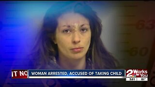 Woman arrested, accused of taking child
