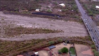 Floodwaters rushing in the North Valley Friday afternoon