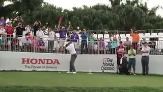 Tiger Woods gets in practice swings at Honda Classic