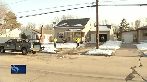 Four injured after car crashes into homes