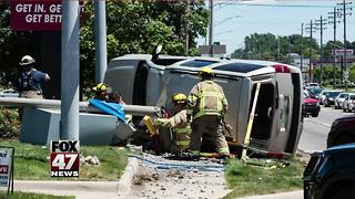 Two car accident flips SUV on side, driver hospitalized