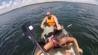 Three People Jump Out Of A Sinking Canoe