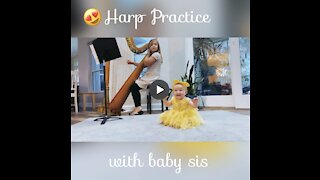 Cute Baby Reacts to Sister Playing 'Beauty & The Beast' on Harp