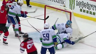 Jack Hughes scores first NHL goal in Devils win over brother Quinn's Canucks