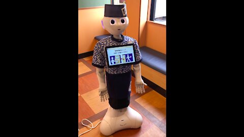 Robot help select Menu and says "Hello" at Sushi Restaurant in Japan