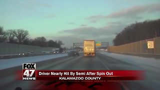 Dashcam video shows close call involving semi