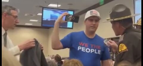 Utah man getting arrested for wearing ‘we are the people’ shirt