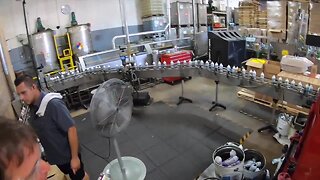 Blaster: Cans being filled on assembly line