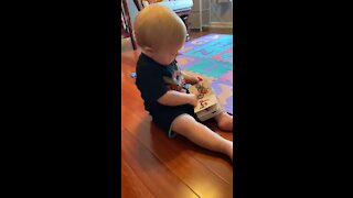 Cute Baby Tries To Read A Book