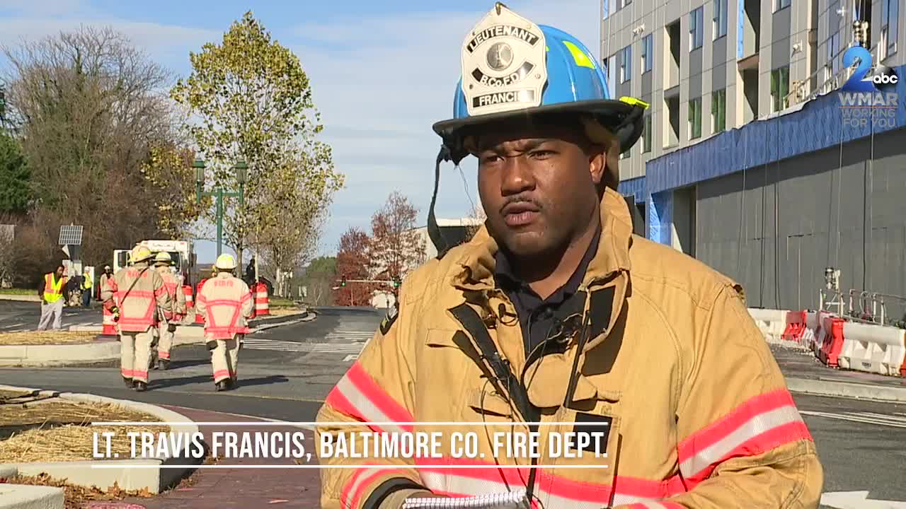 Car crashes into building near Towson Town Center causing evacuation, Hazmat situation