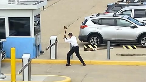 Shocking MOMENT United Airlines pilot takes axe to parking lot gate before arrest #shorts