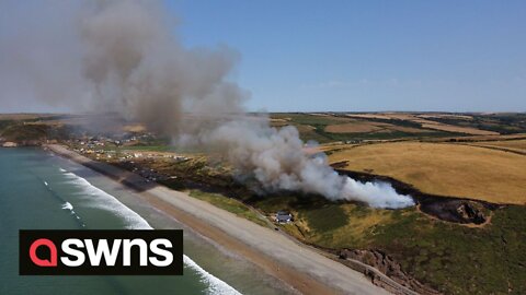 Dramatic drone footage shows large gorse fire at popular UK beach
