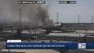 Firefighters battle massive fire at Phoenix salvage yard
