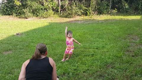 Tot Girl Keeps Falling On The Grass