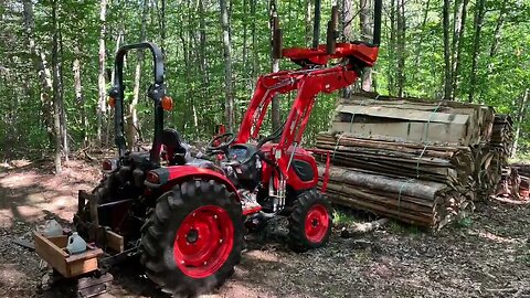 Norwood MX34 with log turning winch