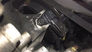 How to remove crankshaft position sensor on a 2005 Mazda RX-8 from underneath