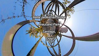 Metal pedestrian bridge at Araucano Park in Santiago, Chile
