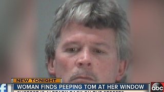 Woman finds peeping tom at her window