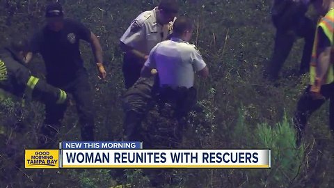 Woman reunites with rescuers who helped her from trapped SUB in water-filled ditch