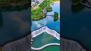 The waterfall is located in the south of China, in the Yunnan province...